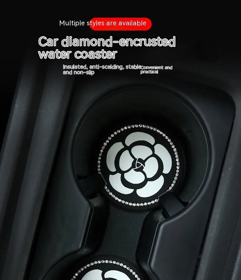 Black and white checkerboard pattern PVC plastic car cup holder mat placed in a vehicle centre console.