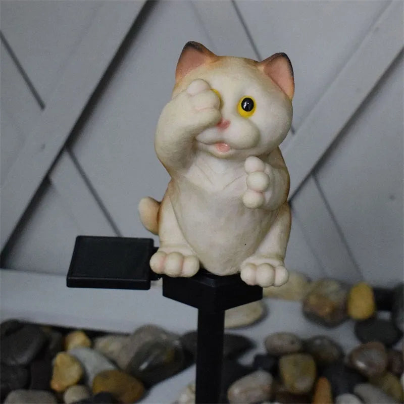 Brown cat-shaped solar lawn light for garden pathway illumination with weather-resistant resin construction