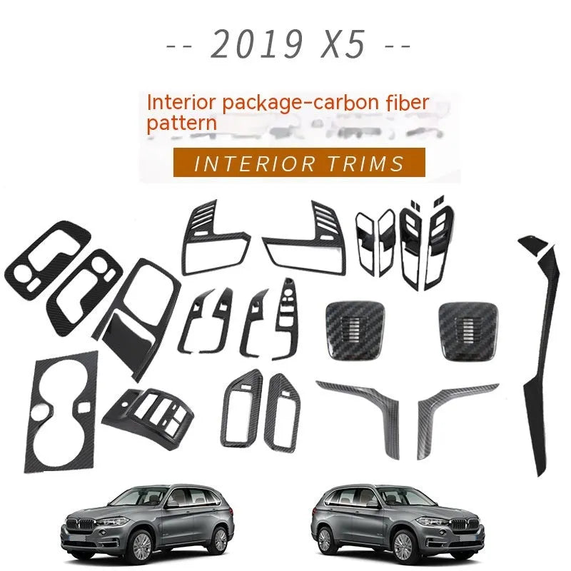 Black ABS centre console trim panel for 2019 BMW X5 cup holder and air vent area.