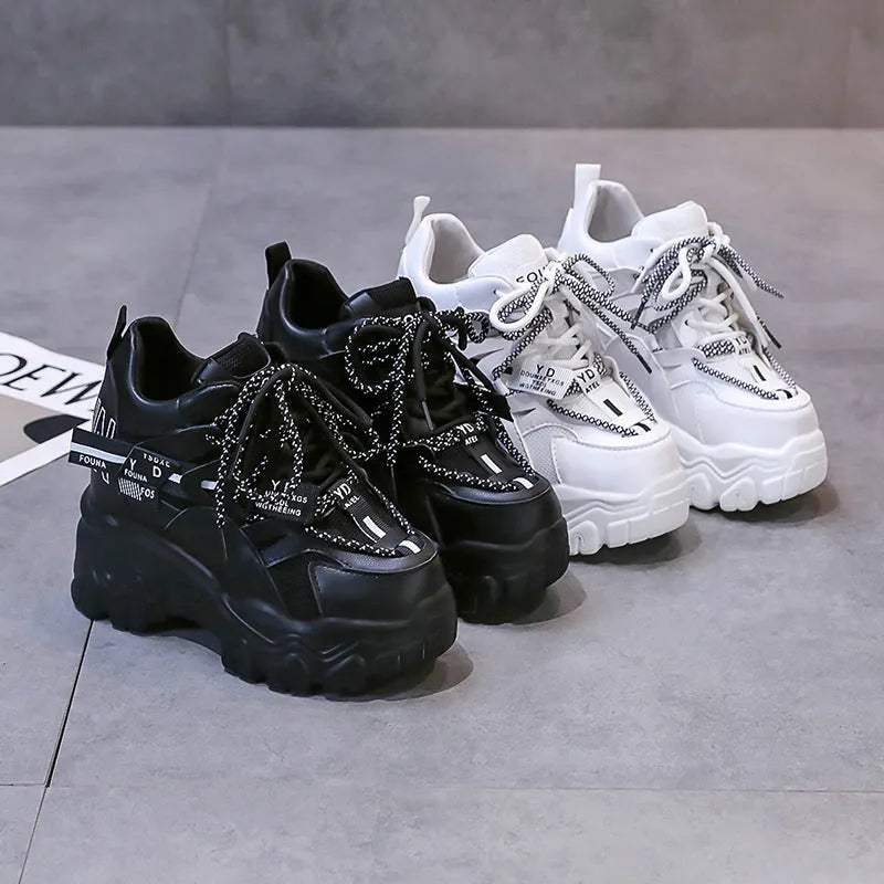 Women's white mesh platform sports shoes with a cross-strap design and rubber sole