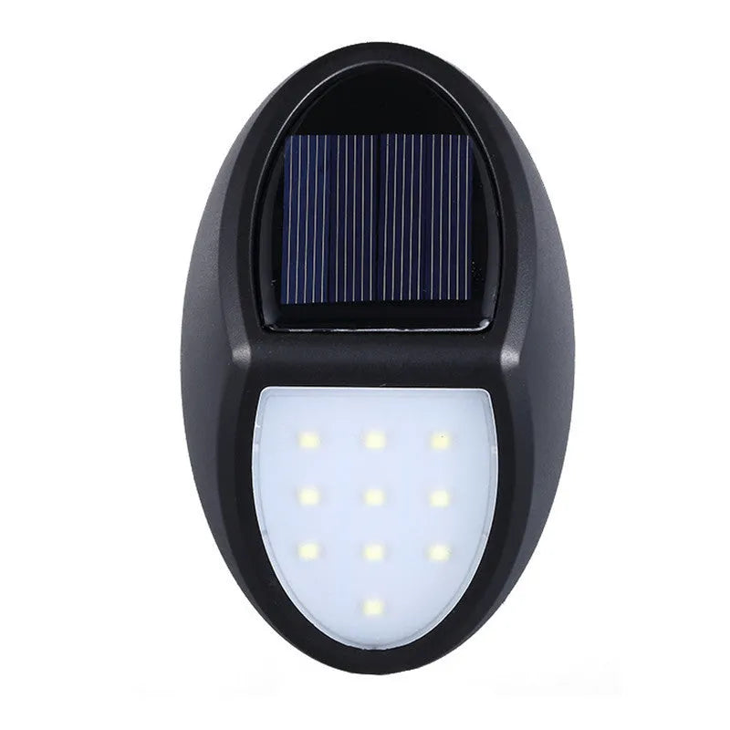 Black solar-powered wall light with solar panel and LED illumination