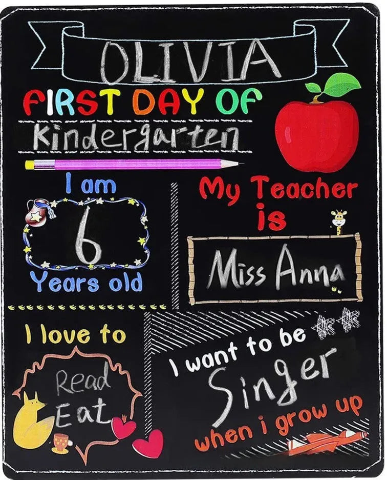 Wooden blackboard with first day of school design on density plate measuring 25.5 by 30 centimetres