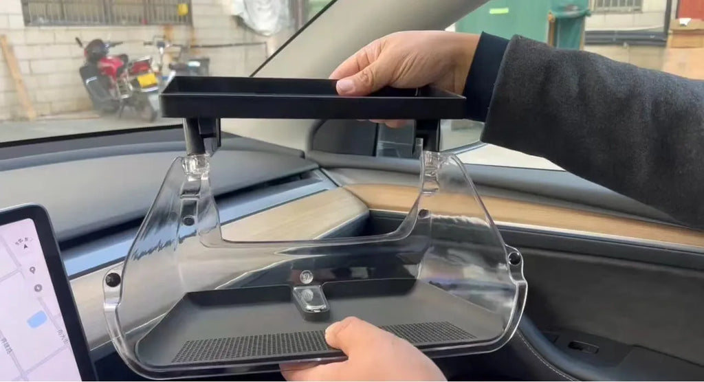 Black ABS plastic storage box for under the Tesla Model 3 and Y centre console screen.