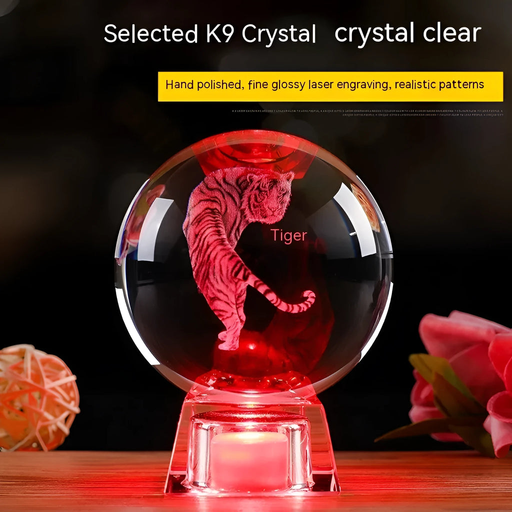 White crystal ball zodiac luminous ornament on electronic base showing Chinese animal sign