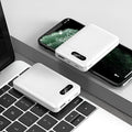 Black and white portable power bank with 10000mAh capacity and USB charging ports