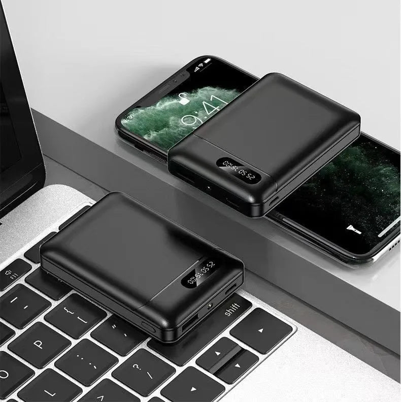 Black and white portable power bank with 10000mAh capacity and USB charging ports