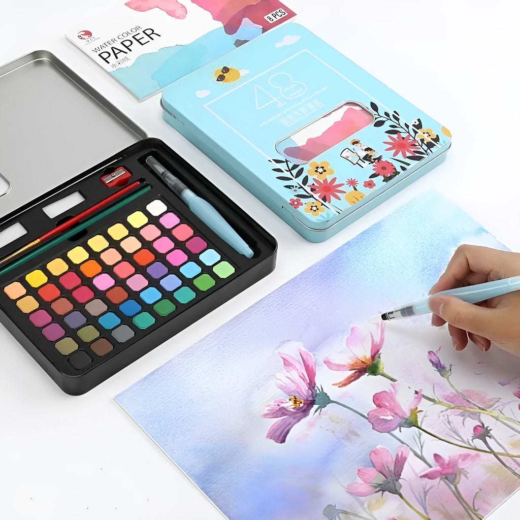 48 colour solid watercolour paint set in box showing Black Knight, Girl Pink and Sunshine Blue shades
