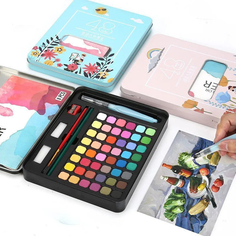 48 colour solid watercolour paint set in box showing Black Knight, Girl Pink and Sunshine Blue shades