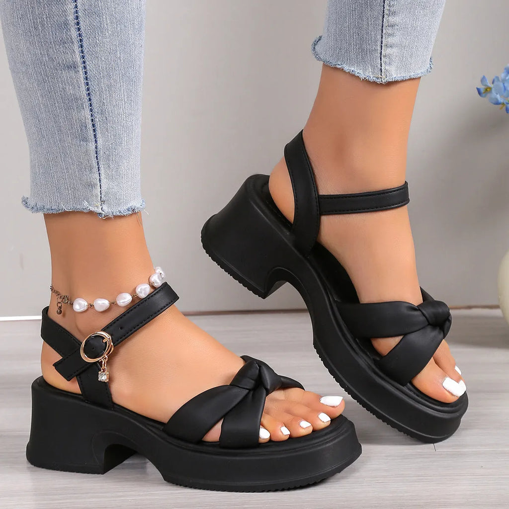 Black romantic-style high-heel slippers with thick rubber sole and button fastening