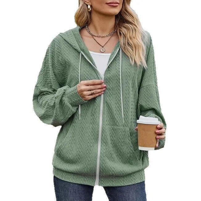 Green women's hooded zipper coat with full-length front zip, loose fit, and long sleeves.