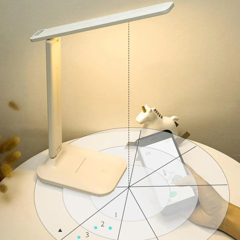 White plastic bedside lamp with touch dimming controls and USB charging port