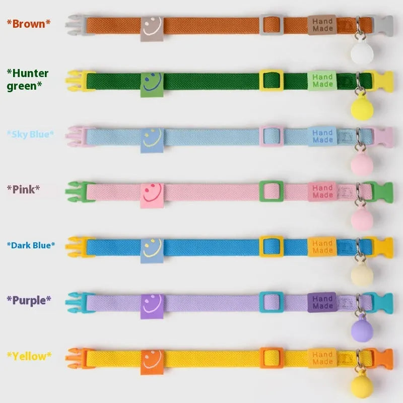 Small dog high elasticity polyester decorative collar shown in yellow, pink, sky blue, purple, brown, dark blue, and dark green colours.