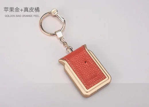 Bluetooth dual SIM adapter keychain for iOS devices in black leather colour with NANO SIM slots