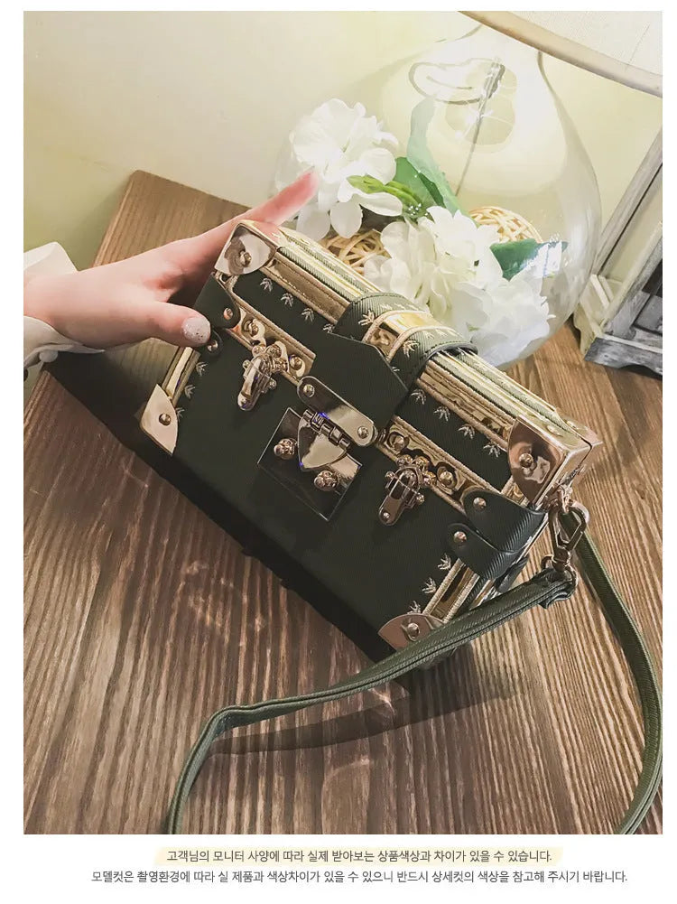 Hard structured PU shoulder bag with flap design and metal hasp closure