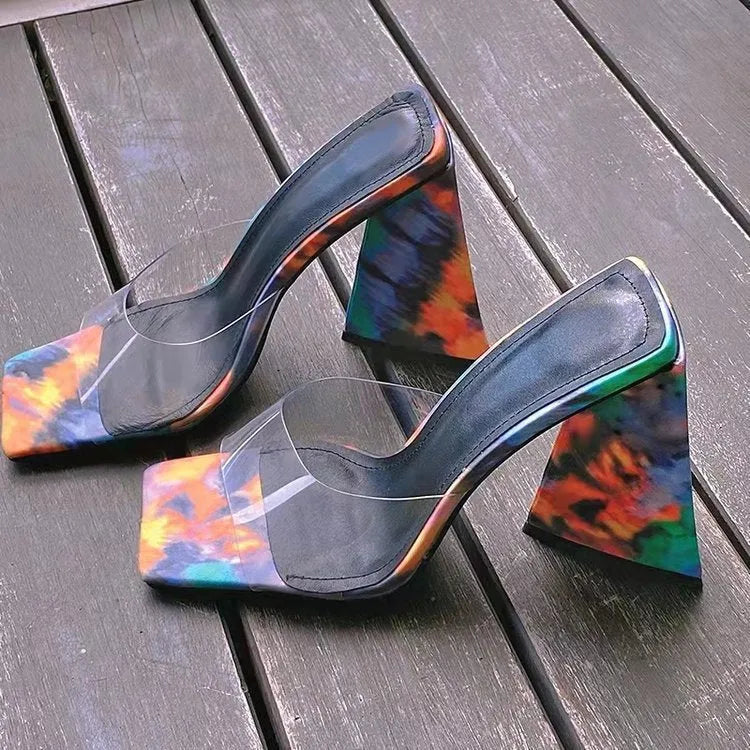Women's black square toe high heel slippers with a thick triangular heel and rubber sole.