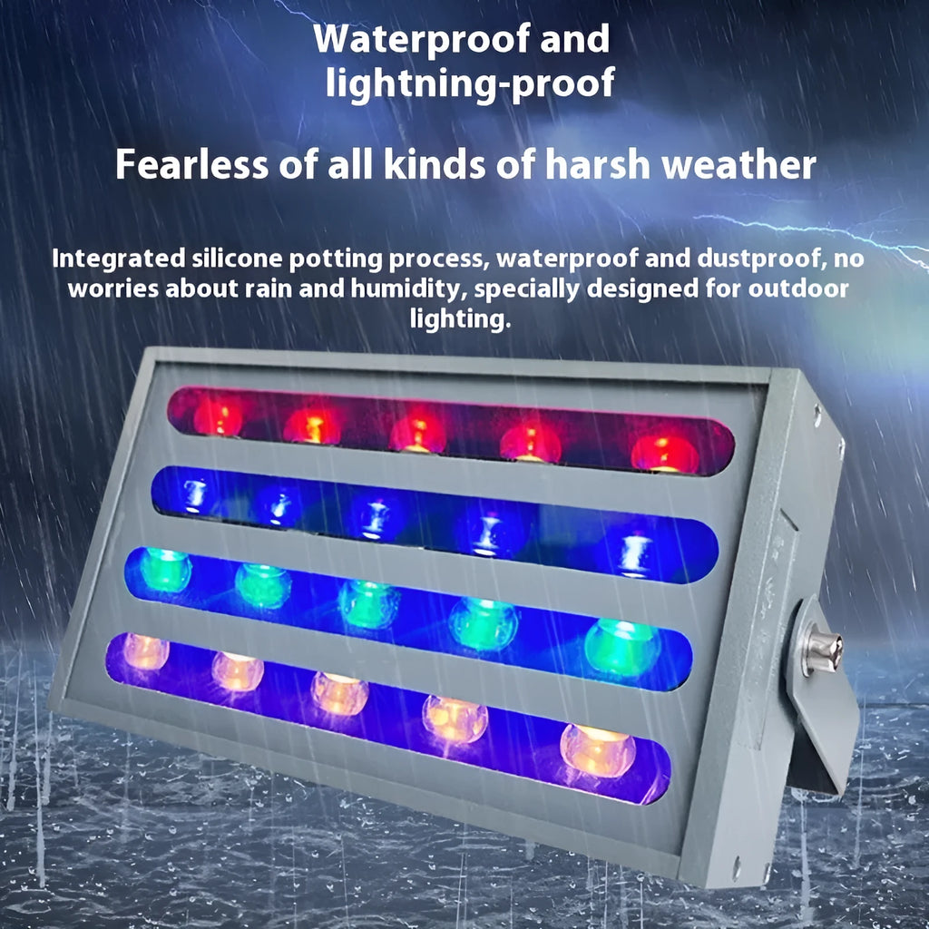 Silver aluminium alloy outdoor LED spotlight projecting multicoloured light onto a tree.