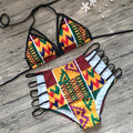 Women's high-waist split bikini swimsuit with digital printing, showing top and shorts.