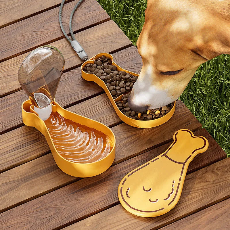 Orange and white portable pet water feeder with water bottle and treat container compartments