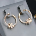 Women's geometric copper ring earrings with electroplated finish in circular design