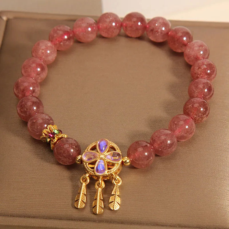 Women's strawberry quartz bracelet with four leaf clover dream catcher pendant charm