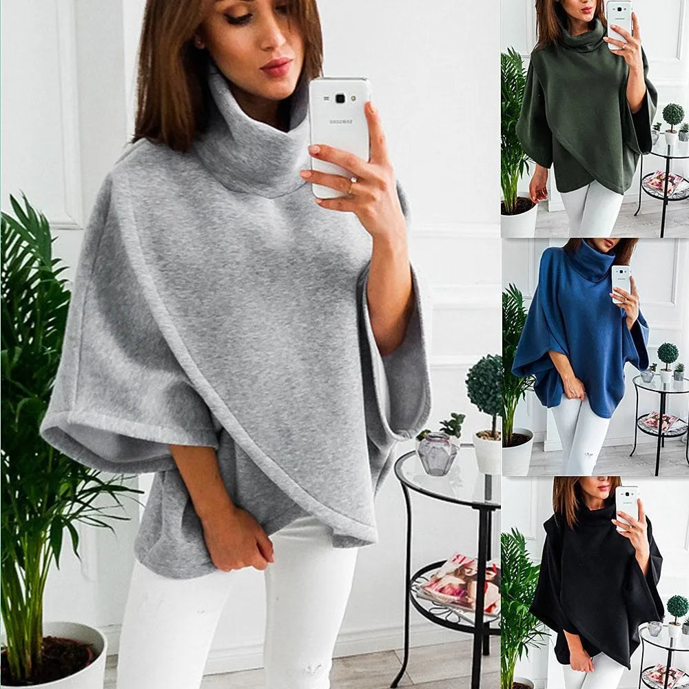 Women's long grey batwing sleeve cardigan sweatshirt with three-button front and stitching detail.