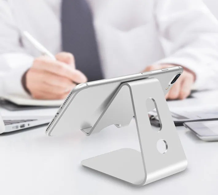 Aluminium alloy universal phone holder in black, red, rose gold, and silver colours for tablets and mobile phones.