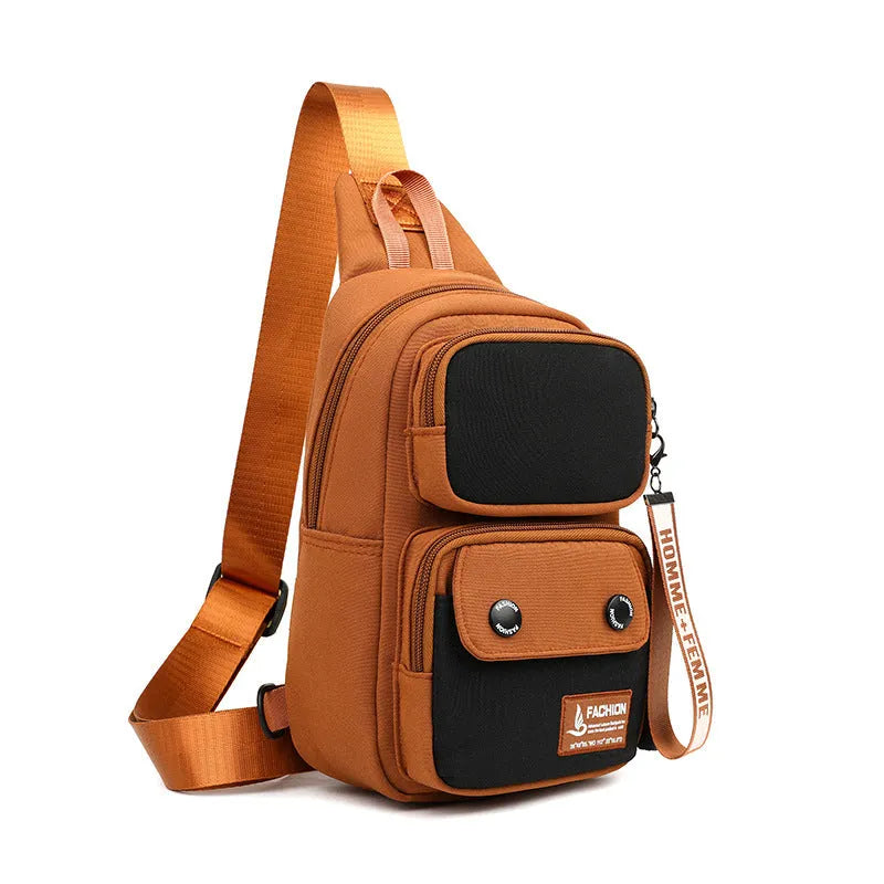 Crossbody shoulder bag in nylon with polyester lining, showing storage compartments