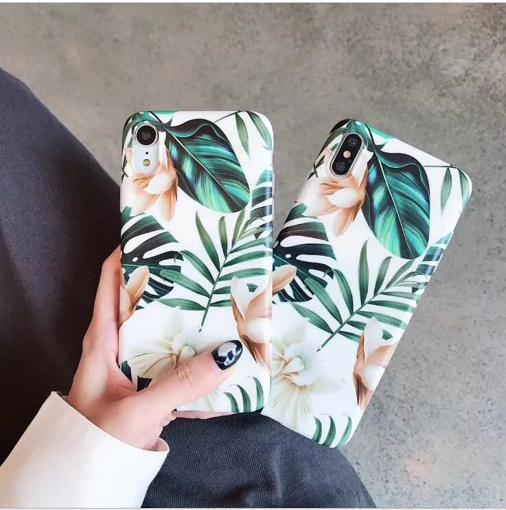 Floral banana leaf design on a flexible TPU phone case for compatible iPhone models.