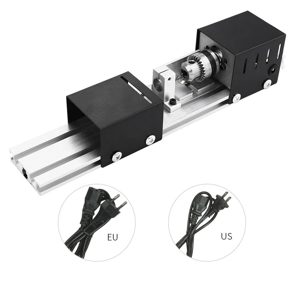 Mini metal manual woodworking lathe with carving knives on a workshop bench