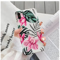 Pink floral pattern TPU back cover case for iPhone on a white background.