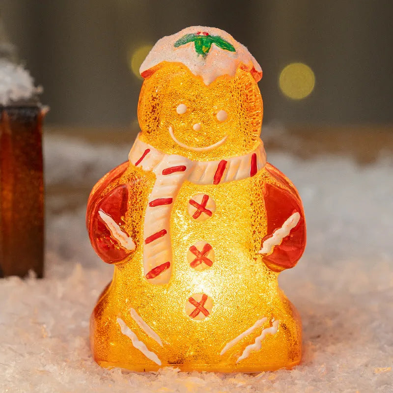 Glowing plastic gingerbread man and snowman Christmas tree ornament with coloured scarf