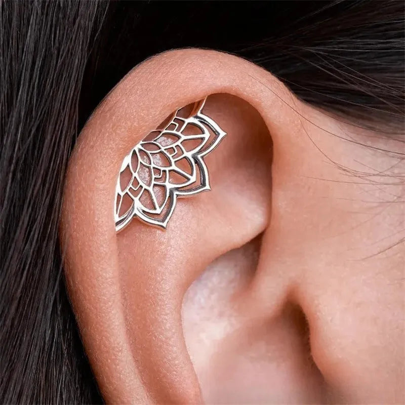 Geometric spider web metal stud earrings with electroplated gold and silver colour options
