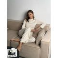 Women's white floral print bell sleeve top and wide leg trousers casual suit