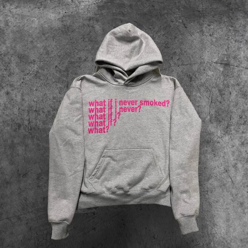 Black hooded sweater with white letter print on front, model wearing size M.