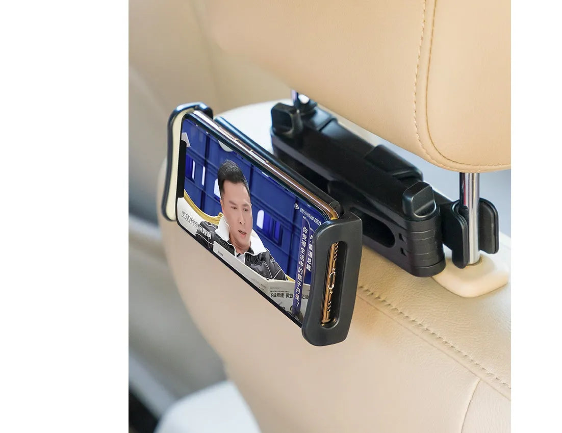 Black universal car phone holder mounted on car rear seat base with tablet in cradle