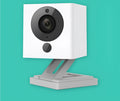 White 50x50x56mm indoor WiFi camera with 1080P resolution, 110° wide-angle lens, and night vision