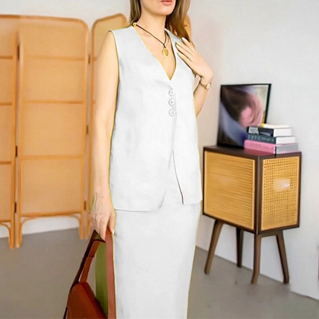 A woman wearing a blue sleeveless top and matching long skirt from a casual two-piece suit set.