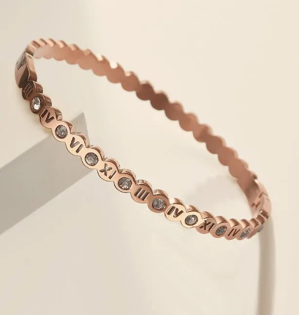 Titanium steel bracelet with number engraving in Korean style, shown in gold, rose gold, and steel colour options