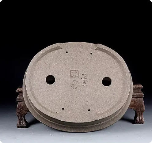 Handmade purple sand ceramic bonsai flower pot with antique oval shape measuring 25x21x6.3cm