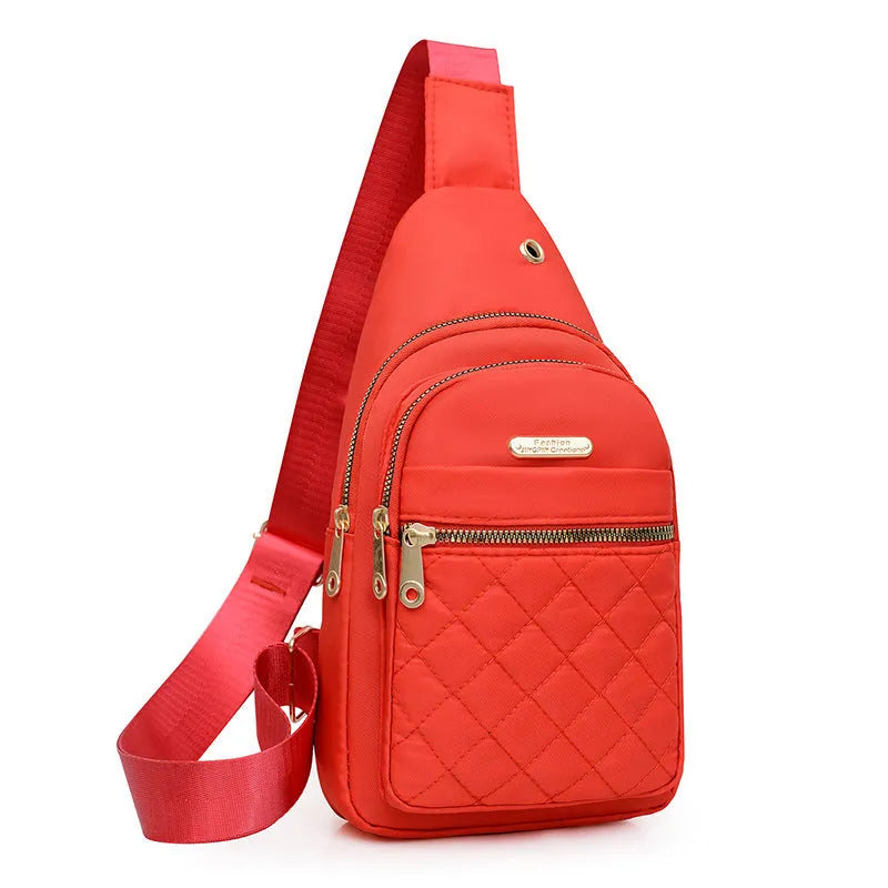Oxford cloth crossbody chest bag for girls in assorted colours on an adjustable strap.