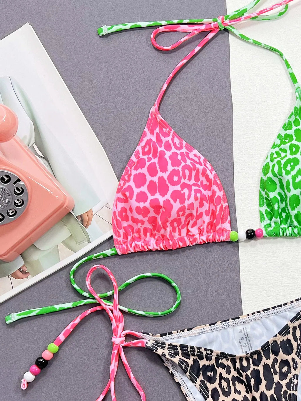 Women's leopard print bikini swimsuit with adjustable bra and split briefs for swimming
