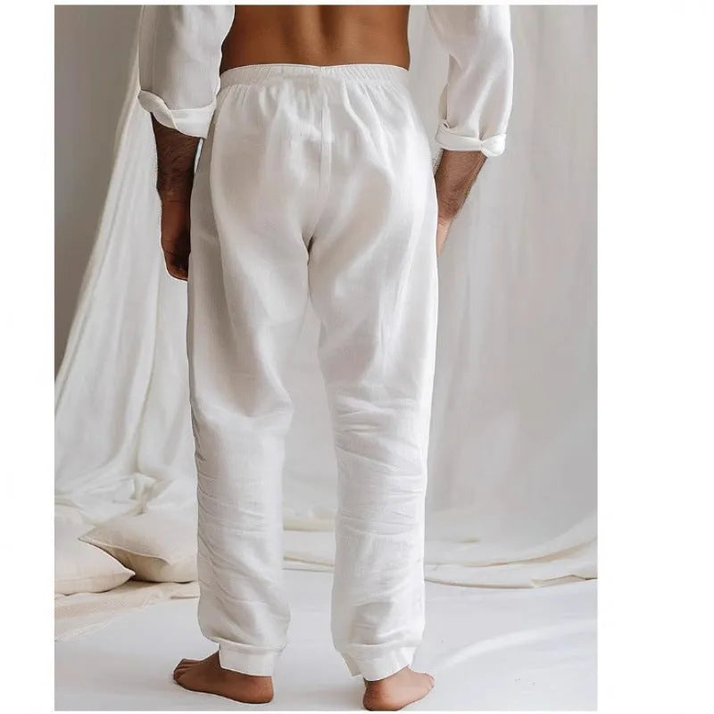 Men's light blue cotton-linen summer trousers with elastic drawstring waist and straight loose leg.