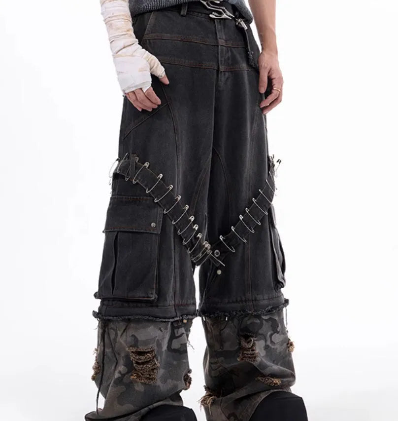 Men's grey cotton denim jeans with camouflage splicing pattern and structural pin and ribbon decorative details