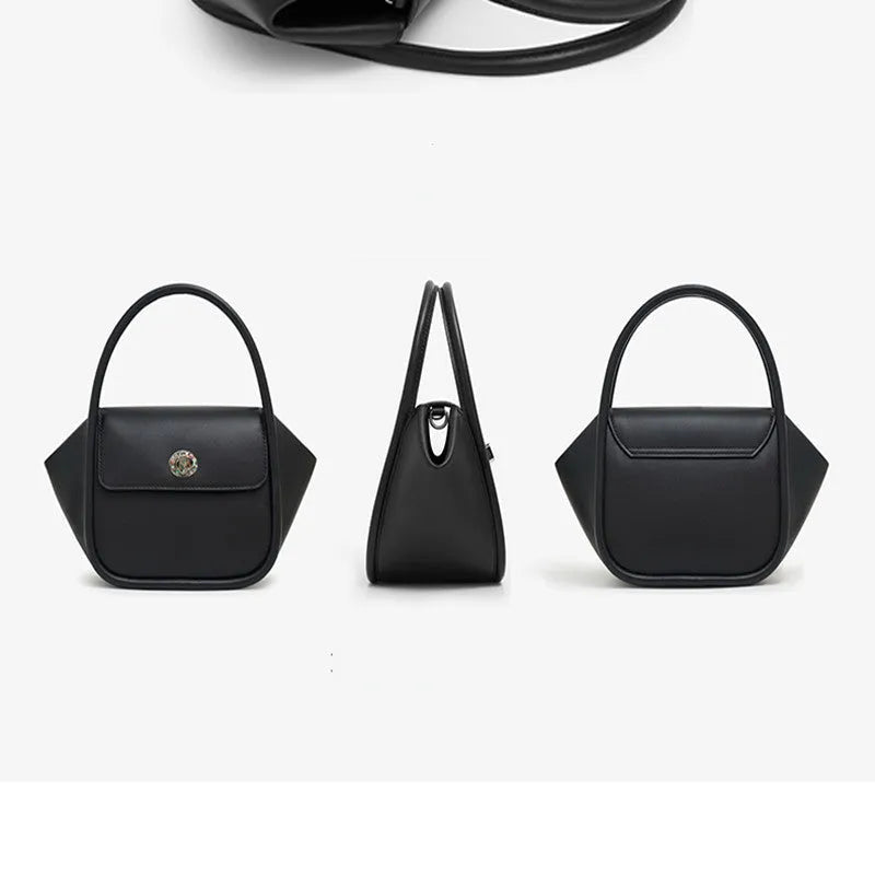 Soft cow leather wing-shaped tote handbag with a buckle latch and single cross-body shoulder strap.