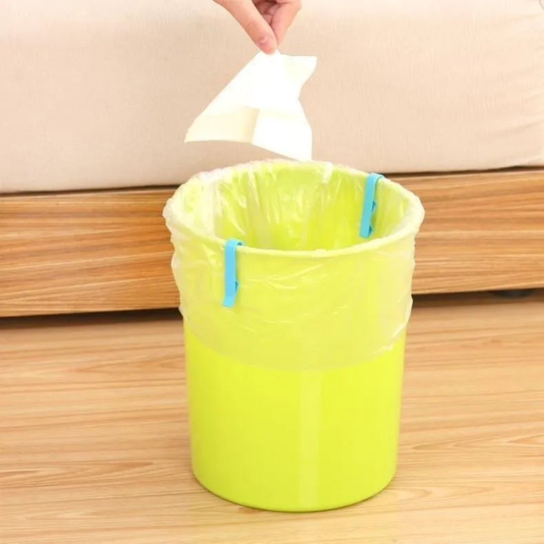 Grey PP plastic non-slip clip for securing bin bags to a rubbish bin rim.
