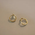 S925 sterling silver fishtail earrings with gold plating showing smooth polished surface