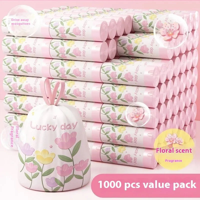 Pink degradable household garbage bags with drawstring closure and mosquito repellent properties