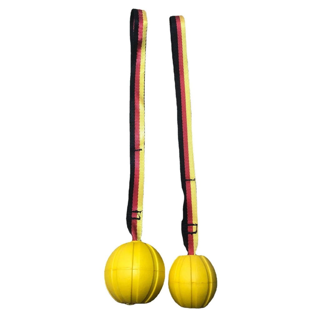 Yellow and camouflage coloured EVA floating dog chew balls in three different sizes on a blue background.
