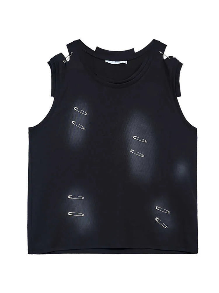 Man modelling a black ripped sleeveless waistcoat vest with an irregular hem and distressed detailing