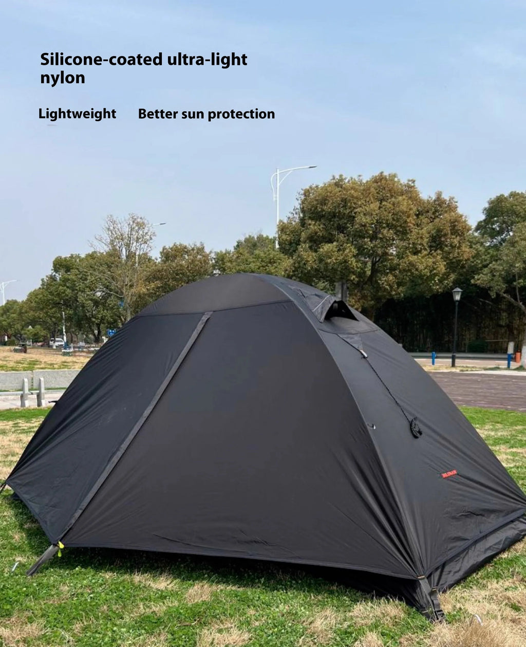 Single person camping tent with aluminium poles in red colour, showing double-layer construction